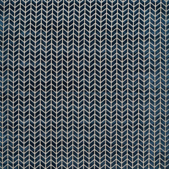 Deep ink-blue woven fabric with fine pale chevrons in a vertical herringbone pattern
