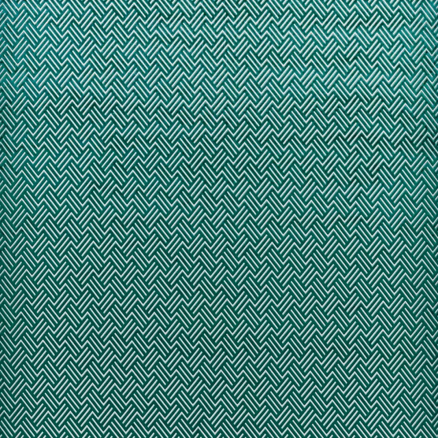 Deep emerald upholstery with fine pale zigzag lines in a dense geometric weave