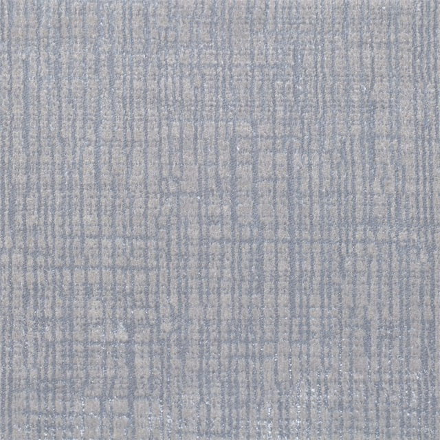 Pale blue-grey velvet with fine vertical striations and softly mottled texture