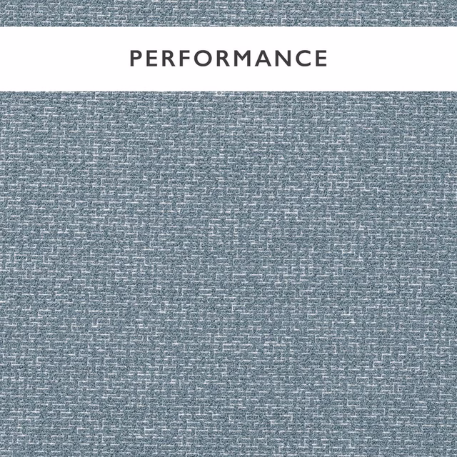 Cool blue-grey boucle with chalk flecks and a tightly nubby woven texture