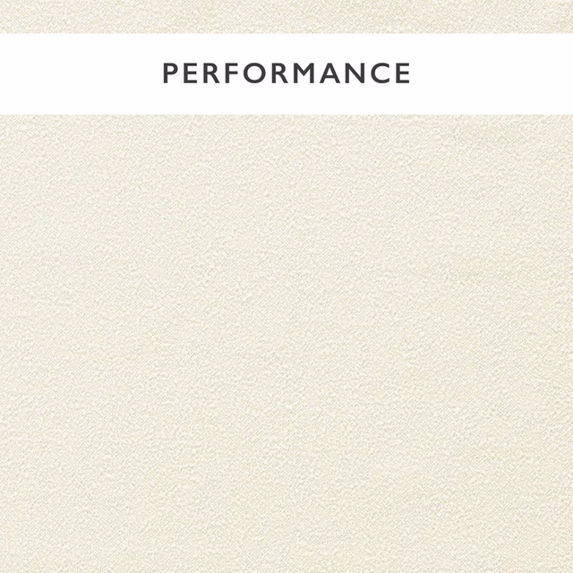 Close-up of pale chalk ivory bouclé with a fine, softly flecked nubby weave