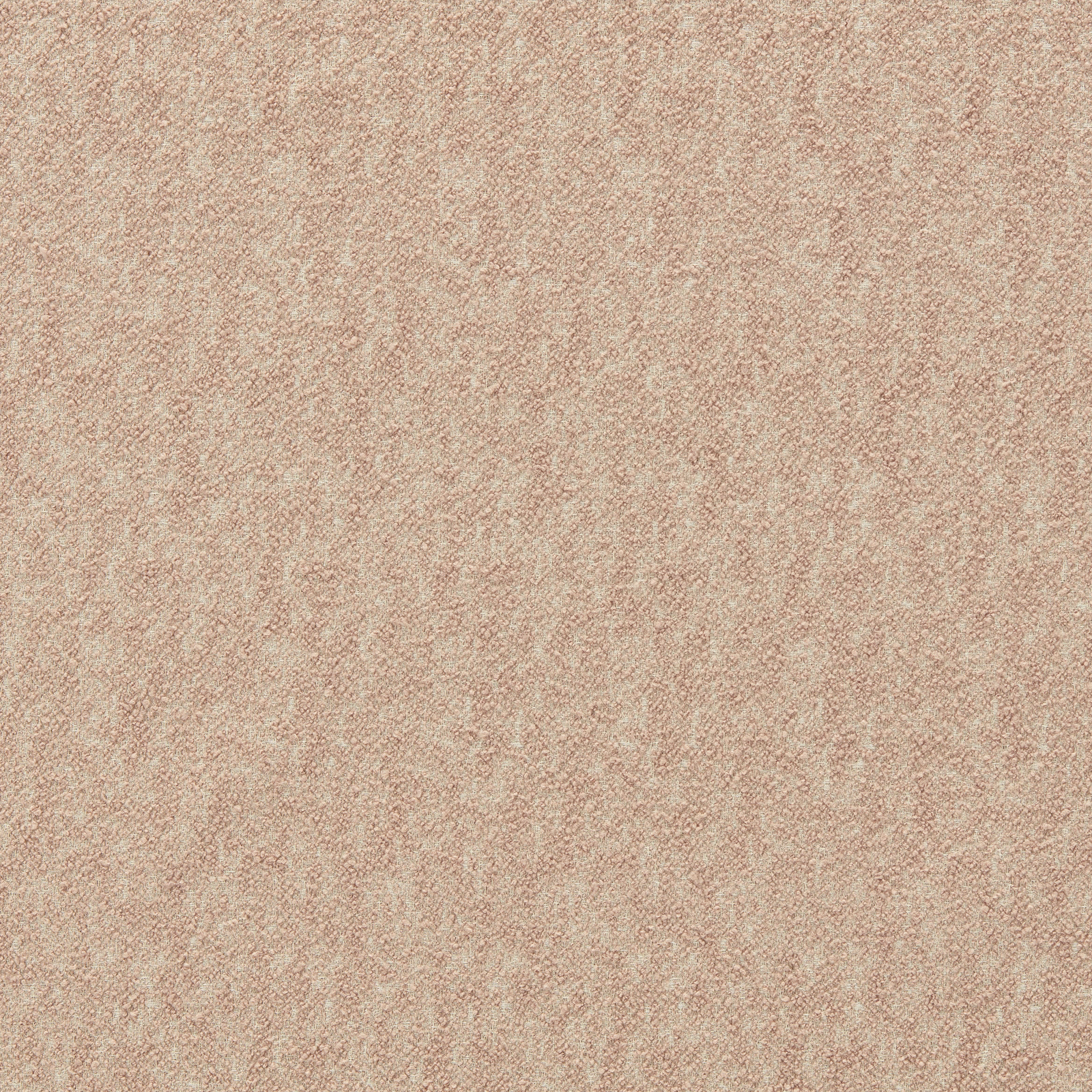 Close-up of softly mottled dusty blush-pink boucle upholstery fabric with nubby texture