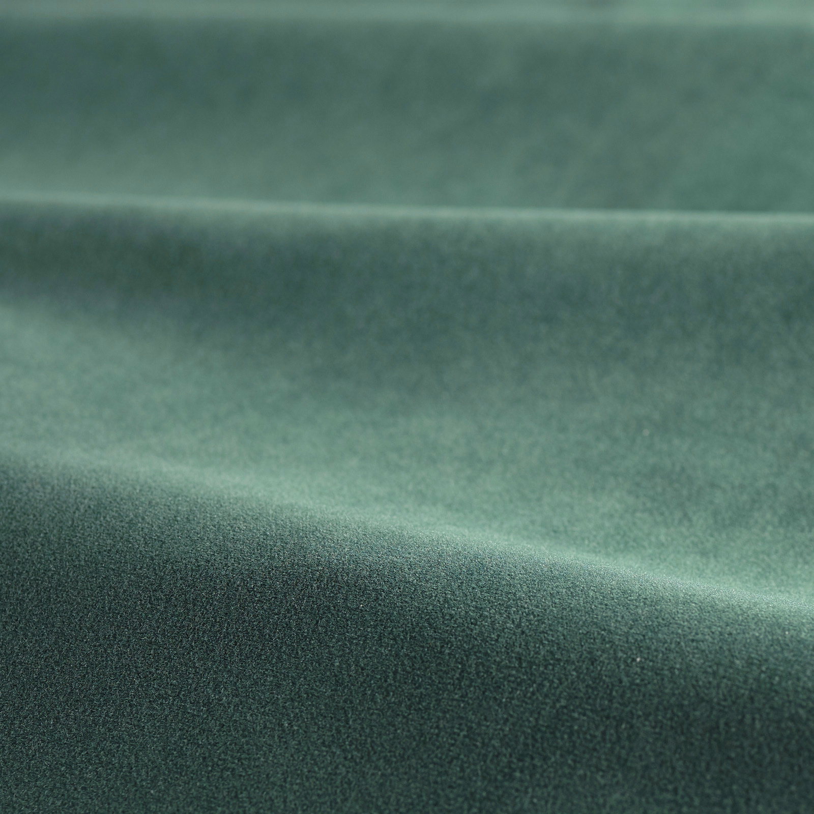 Deep bay-green velvet with a dense, softly shifting pile across folded swatch
