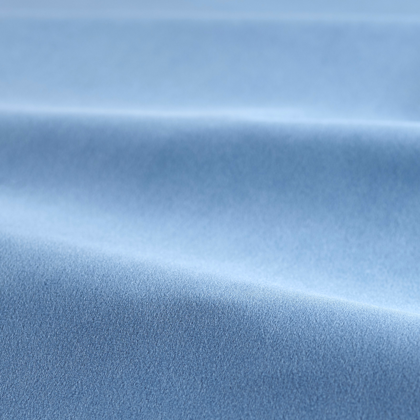 Cool powder-blue velvet swatch with soft folds and light-catching plush pile