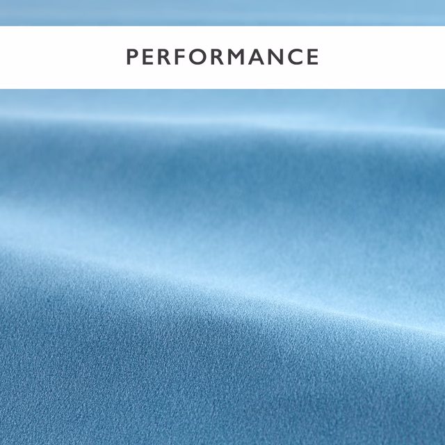 Cool powder-blue velvet swatch with soft folds and light-catching plush pile