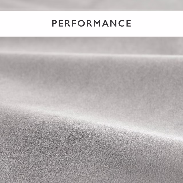Cool dove-grey velvet with a dense plain pile catching a soft silvery highlight