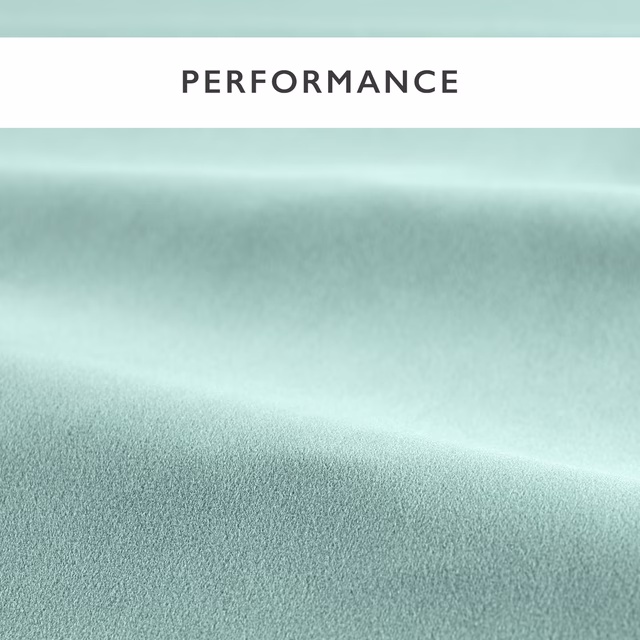 Icy blue-grey velvet pile catching light across a softly folded swatch