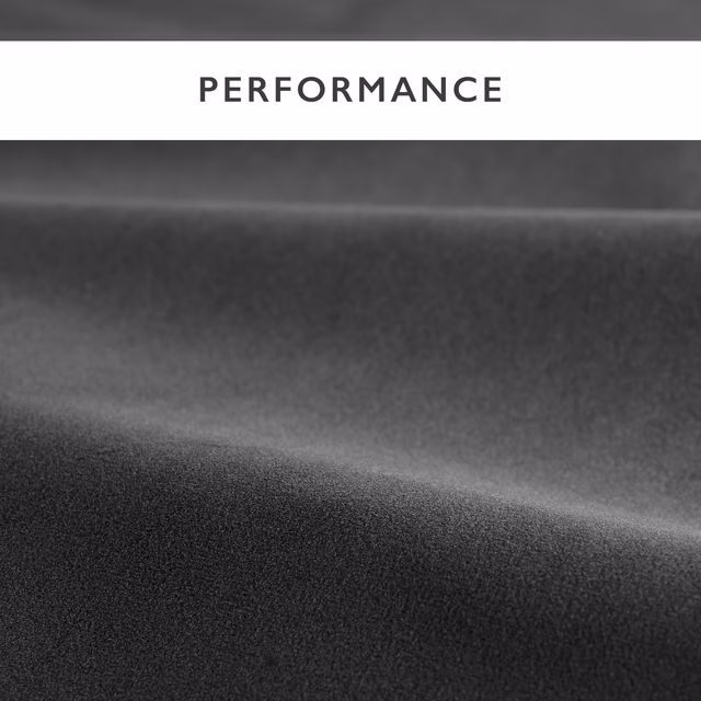Deep graphite-grey velvet folded to show a soft, subtly reflective pile
