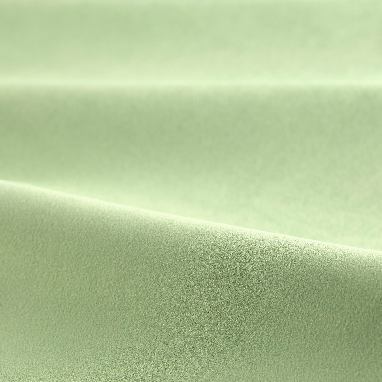 Soft mint-green velvet with a smooth plush nap and gentle sheen