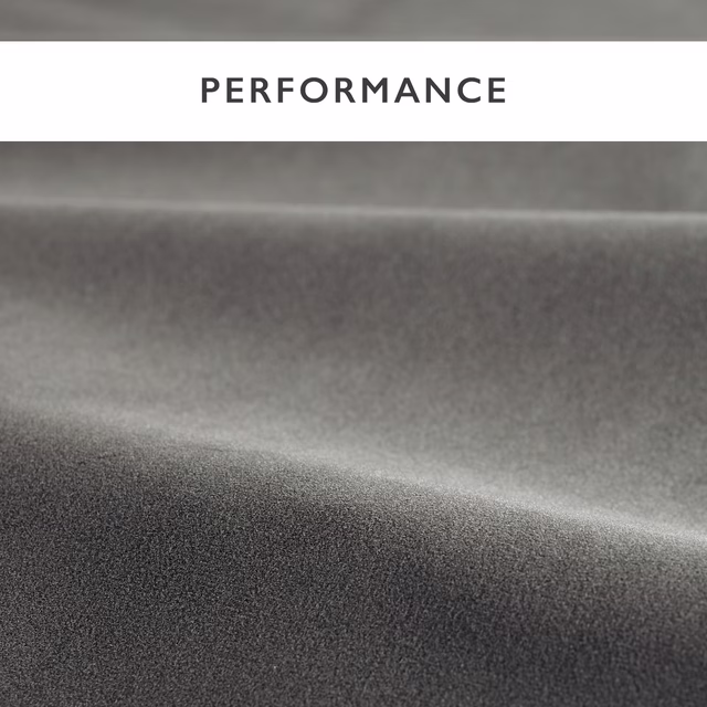 Folded mole-grey velvet showing charcoal shadows and silver nap highlights