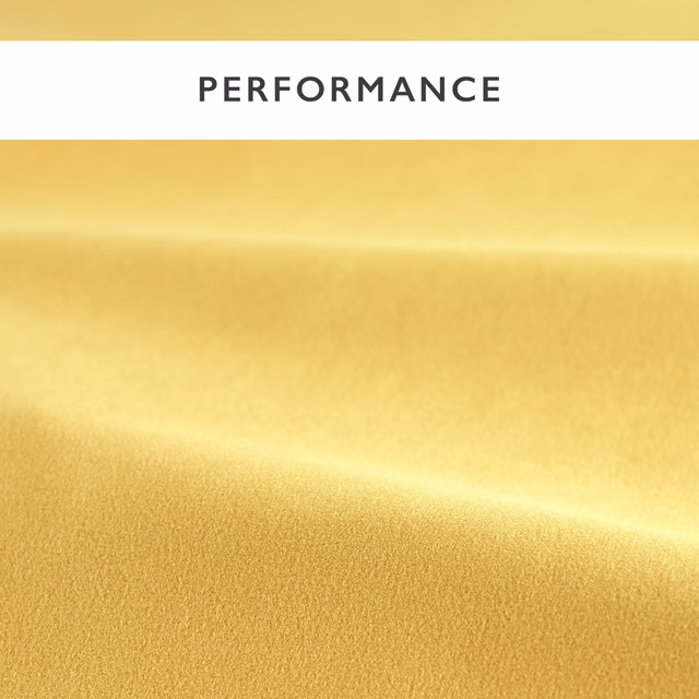Warm golden-yellow velvet swatch showing plush pile and softly shaded horizontal folds