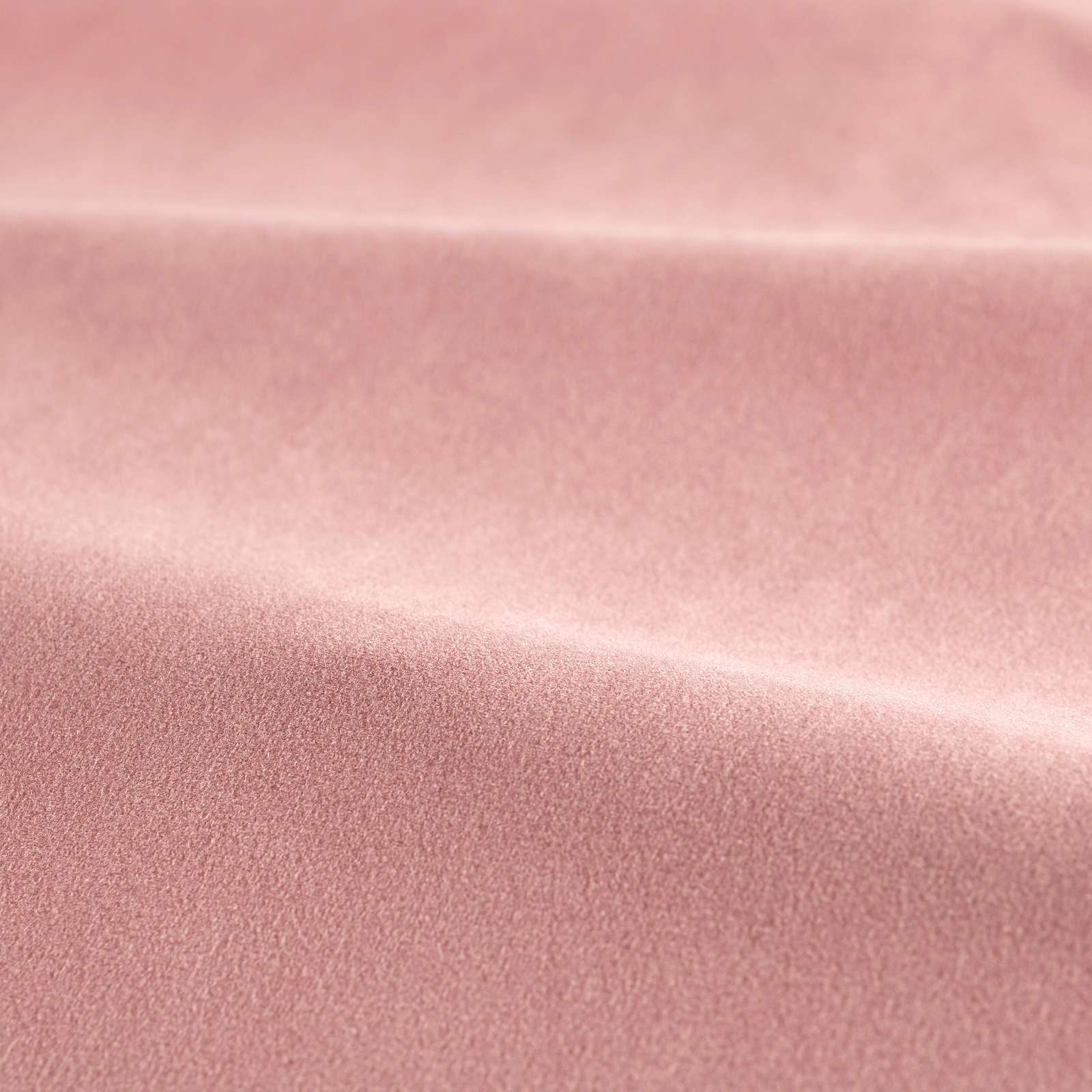 Dusty rose-pink velvet with a smooth pile and soft light-catching fold