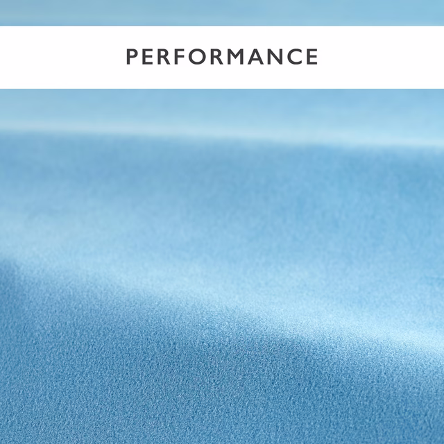 Pale sky blue velvet swatch showing a smooth nap and soft horizontal sheen
