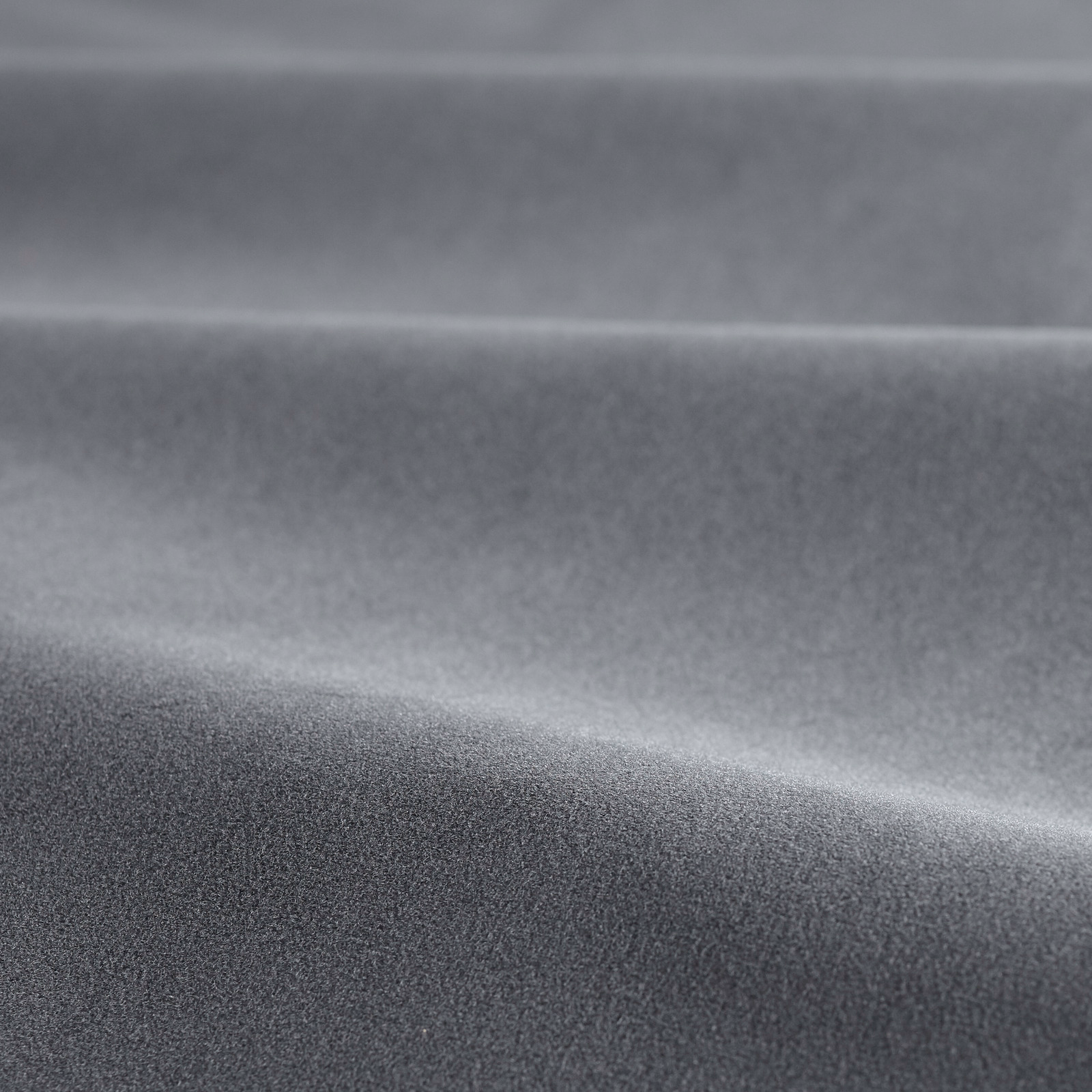 Cool slate-grey velvet with a fine pile and softly shifting fold highlights