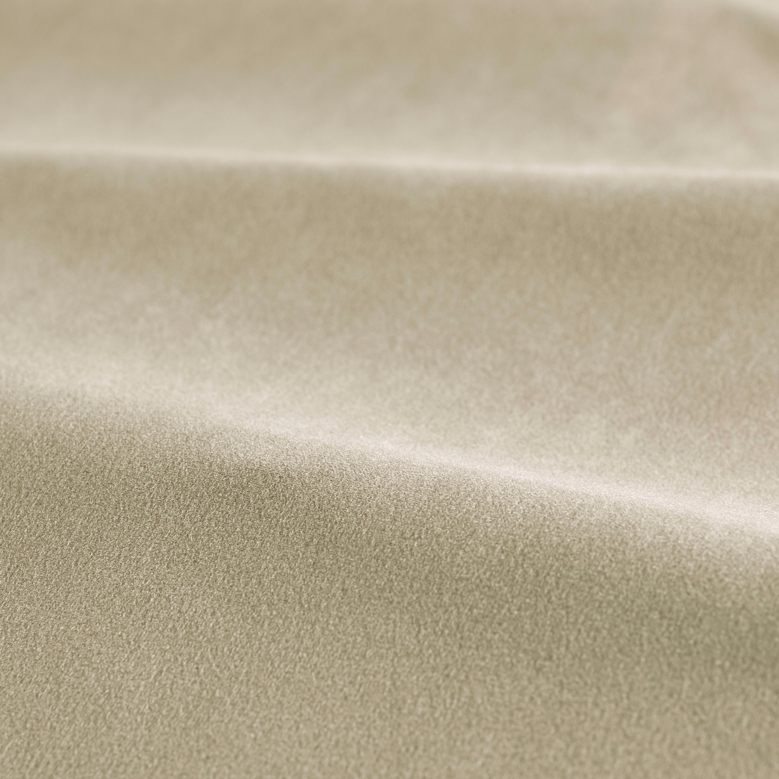 Close-up of warm taupe velvet with a soft directional sheen
