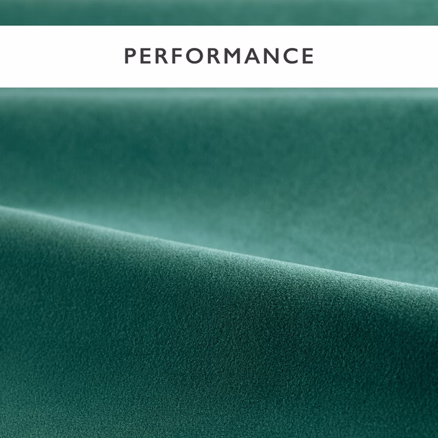 Deep teal velvet pile showing a soft directional sheen across the folded swatch