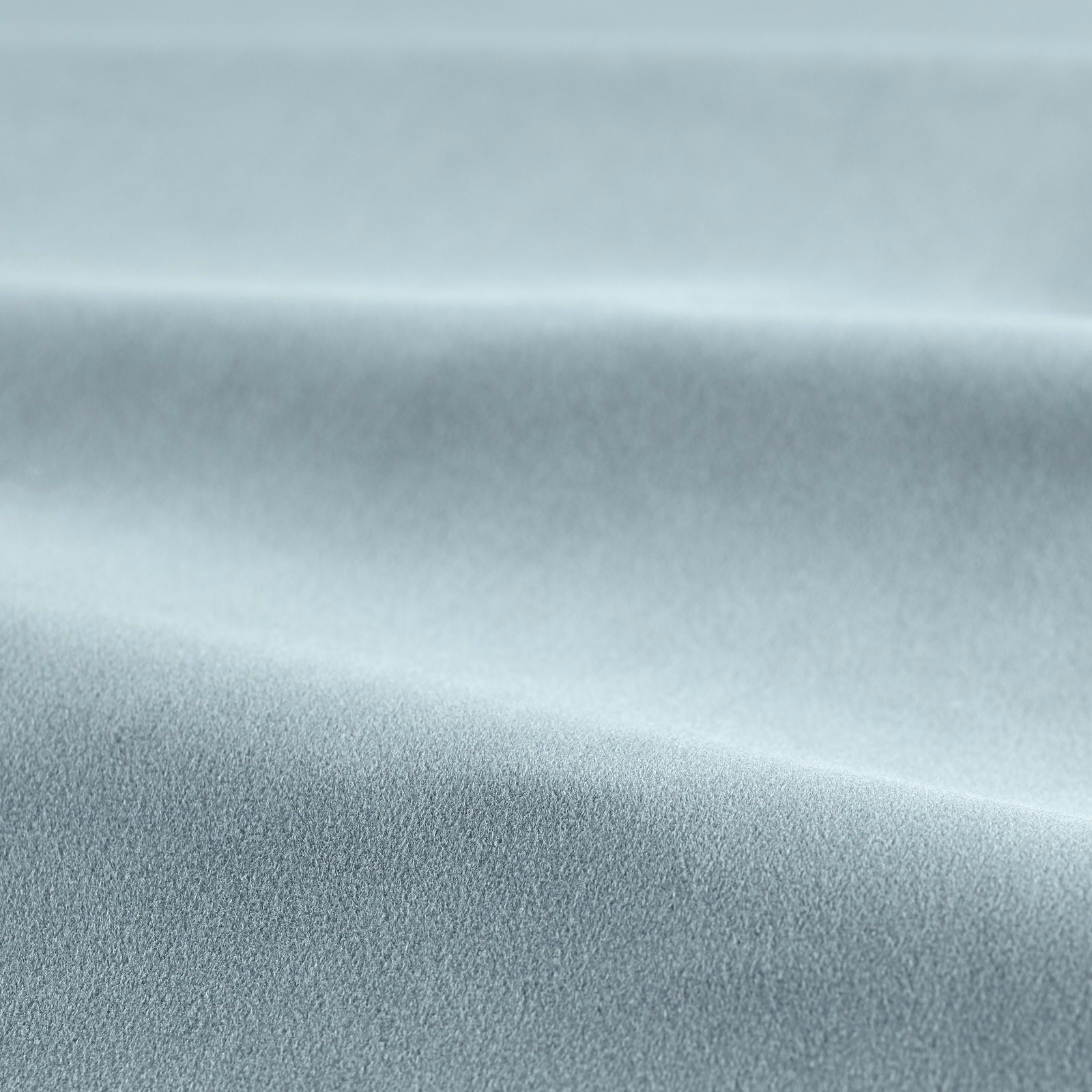 Pale blue-grey velvet swatch showing a plush nap and softly folded highlights