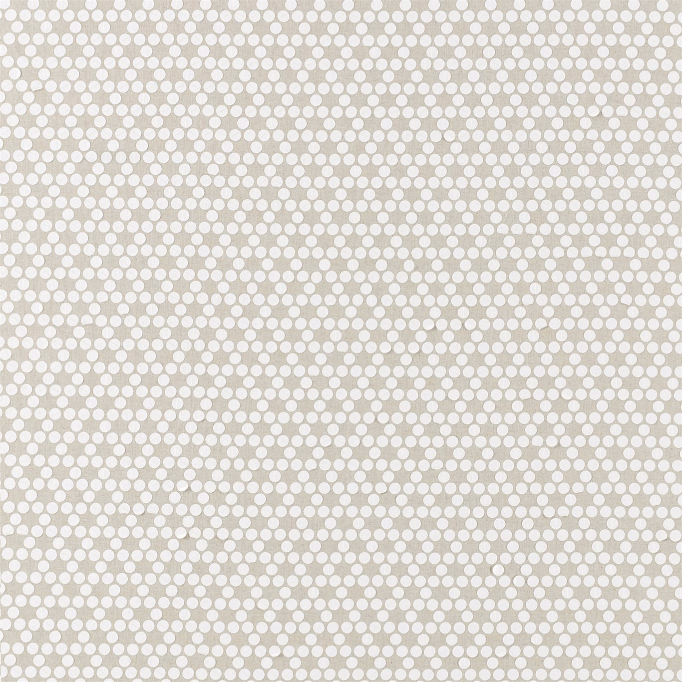 Warm jute-beige fabric with dense white circular geometric dots and a softly woven texture