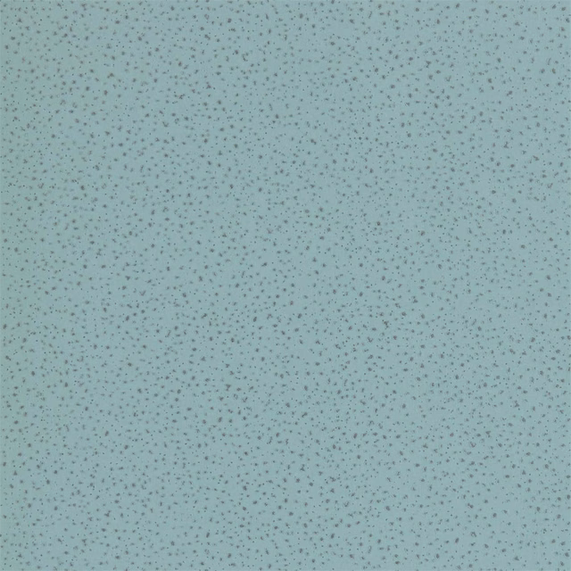 Pale blue-grey wallpaper with dense tiny darker speckles across an even surface