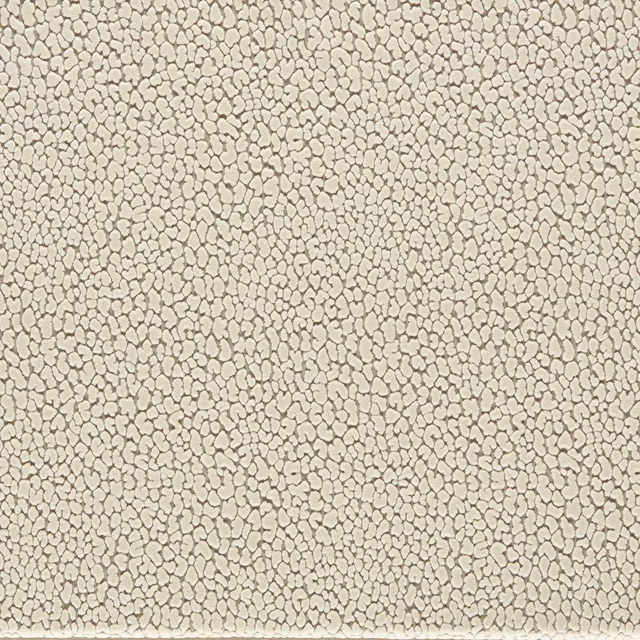 Chalk ivory velvet with a dense fine taupe pebble-like all-over texture