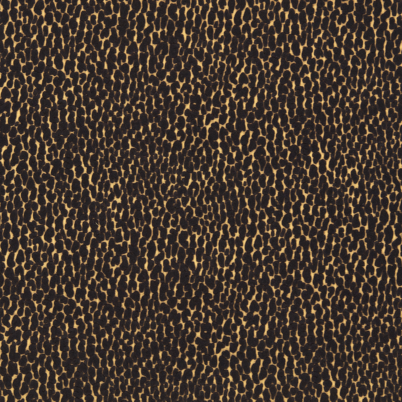Dense ebony velvet with irregular bronze-gold pebble flecks in a close stippled pattern