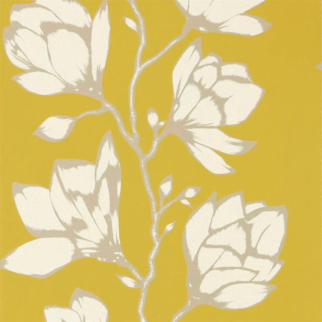 Saffron yellow wallpaper with oversized cream leaves and silver-grey branch outlines
