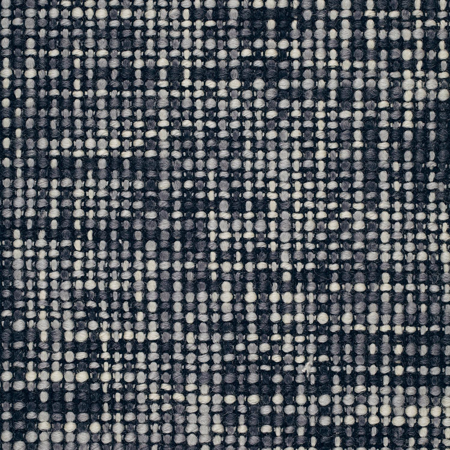 Charcoal, black and ivory nubby weave with irregular vertical rows and mottled depth