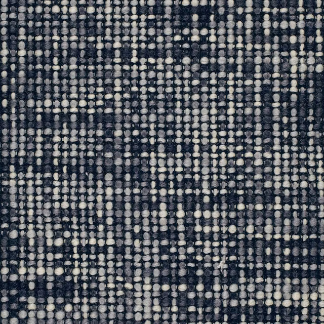 Charcoal, black and ivory nubby weave with irregular vertical rows and mottled depth
