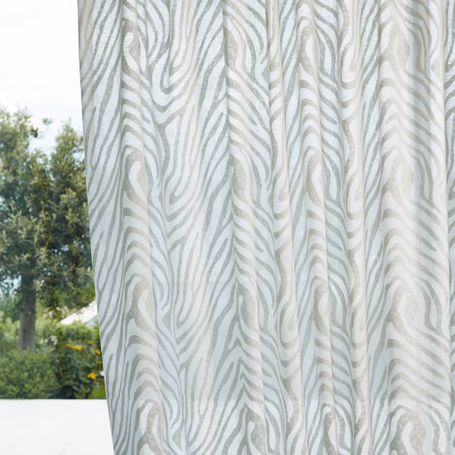 Translucent chalk curtain with pale sage-grey flowing organic stripes in daylight