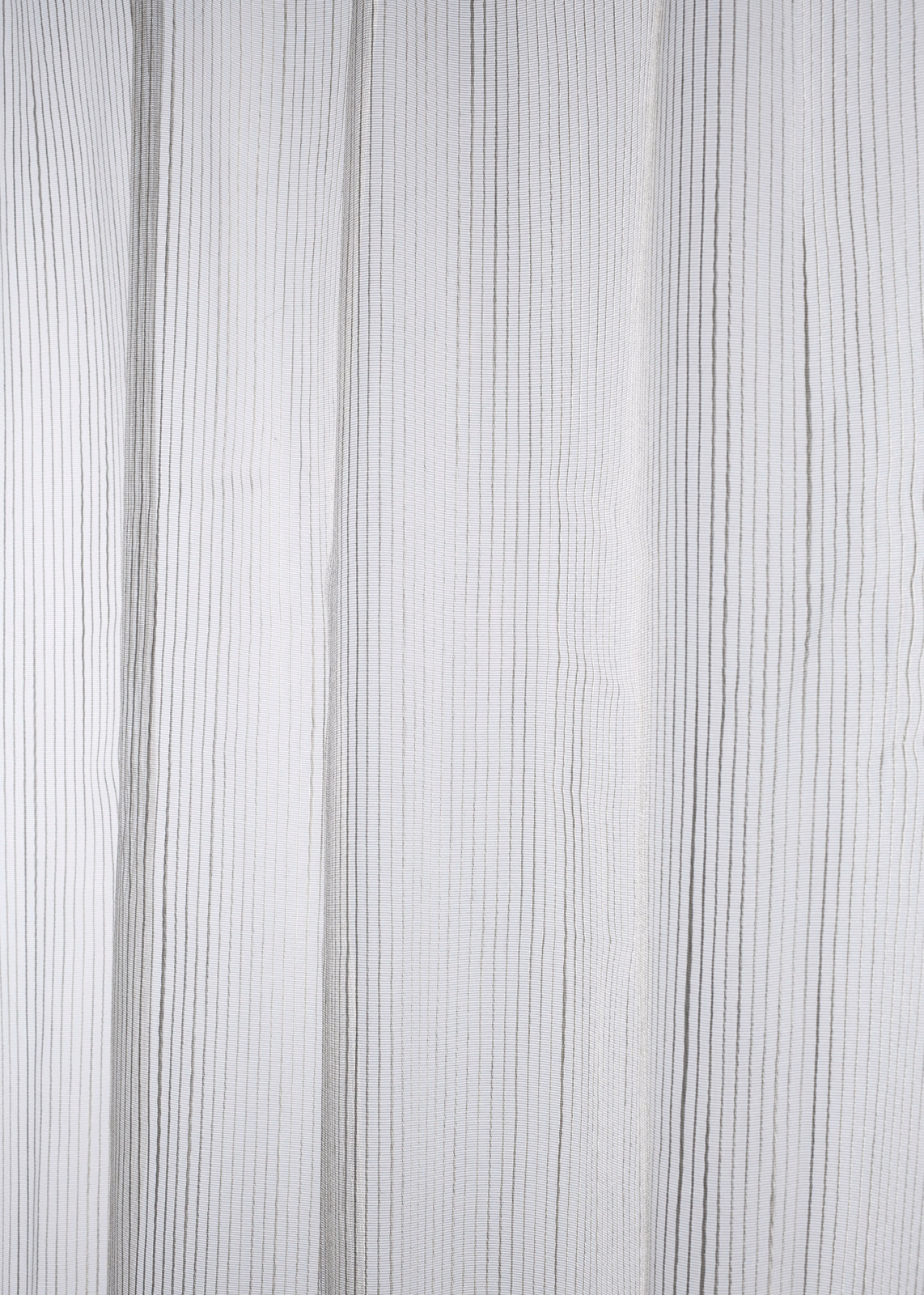 Pale stone sheer with fine uneven vertical grey stripes and a lightly translucent weave