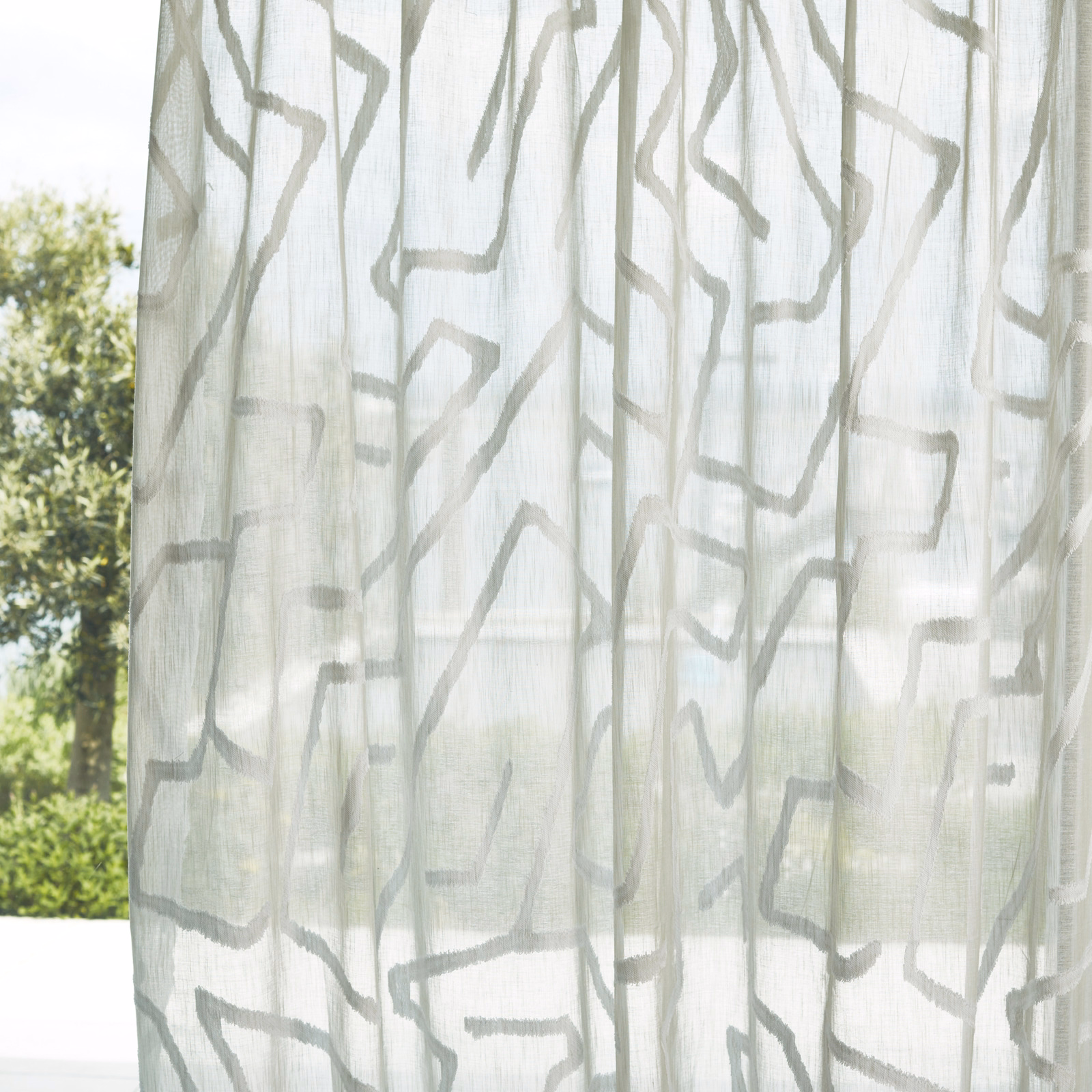 Chalk sheer curtain with irregular soft grey linear motifs and translucent fine weave