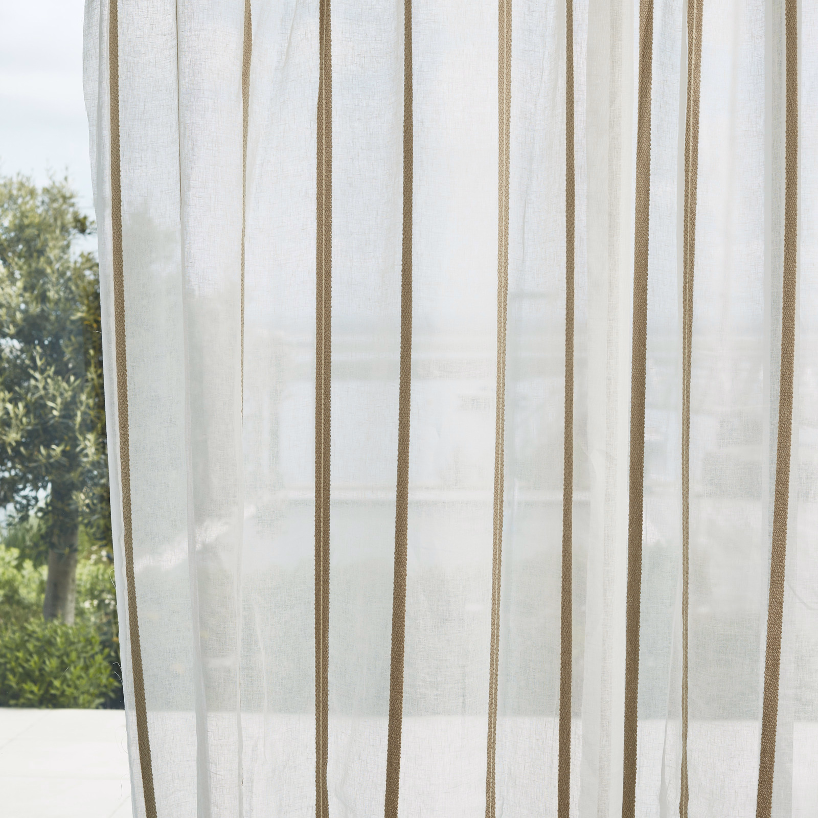 Chalk sheer curtain with narrow taupe vertical stripes and translucent open weave