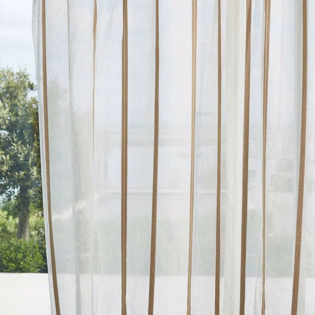 Chalk sheer curtain with narrow taupe vertical stripes and translucent open weave