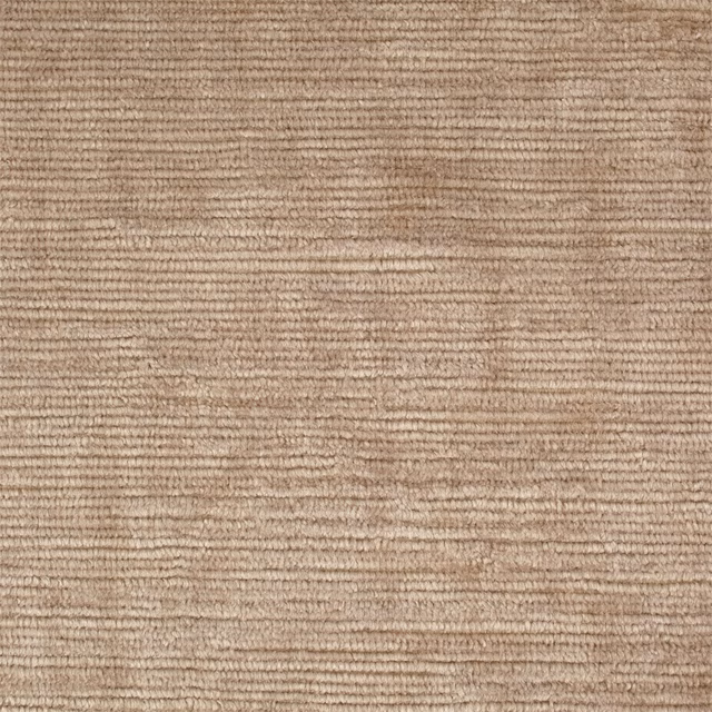 Close-up of warm fawn taupe velvet with fine horizontal ribbed texture and soft tonal variation