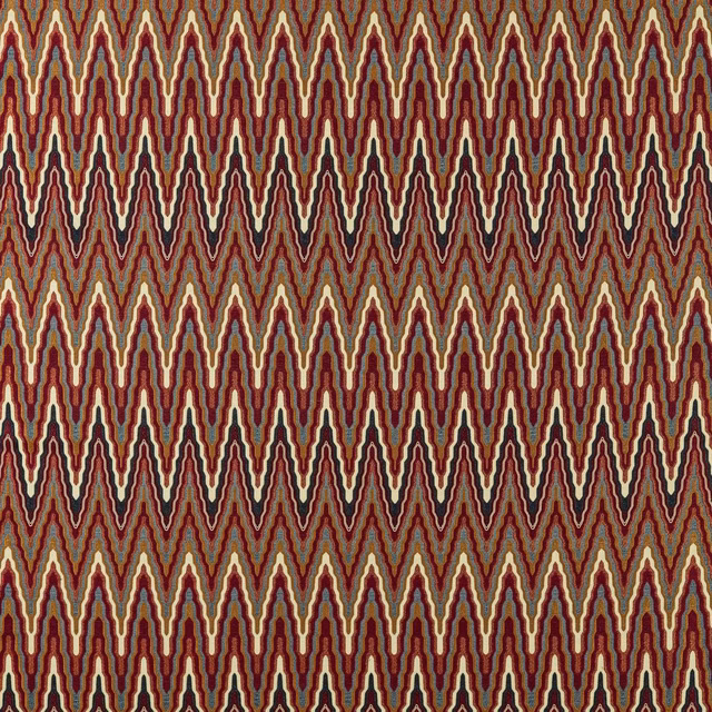 Dense indigo and maroon zigzags edged with cream and olive on woven ground