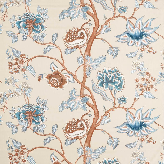 Cream floral fabric with blue blooms, terracotta branches and pale blue leaves