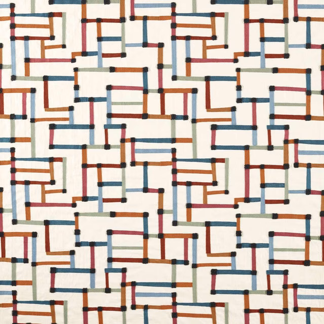 Cream woven fabric with terracotta, spice and midnight geometric maze lines