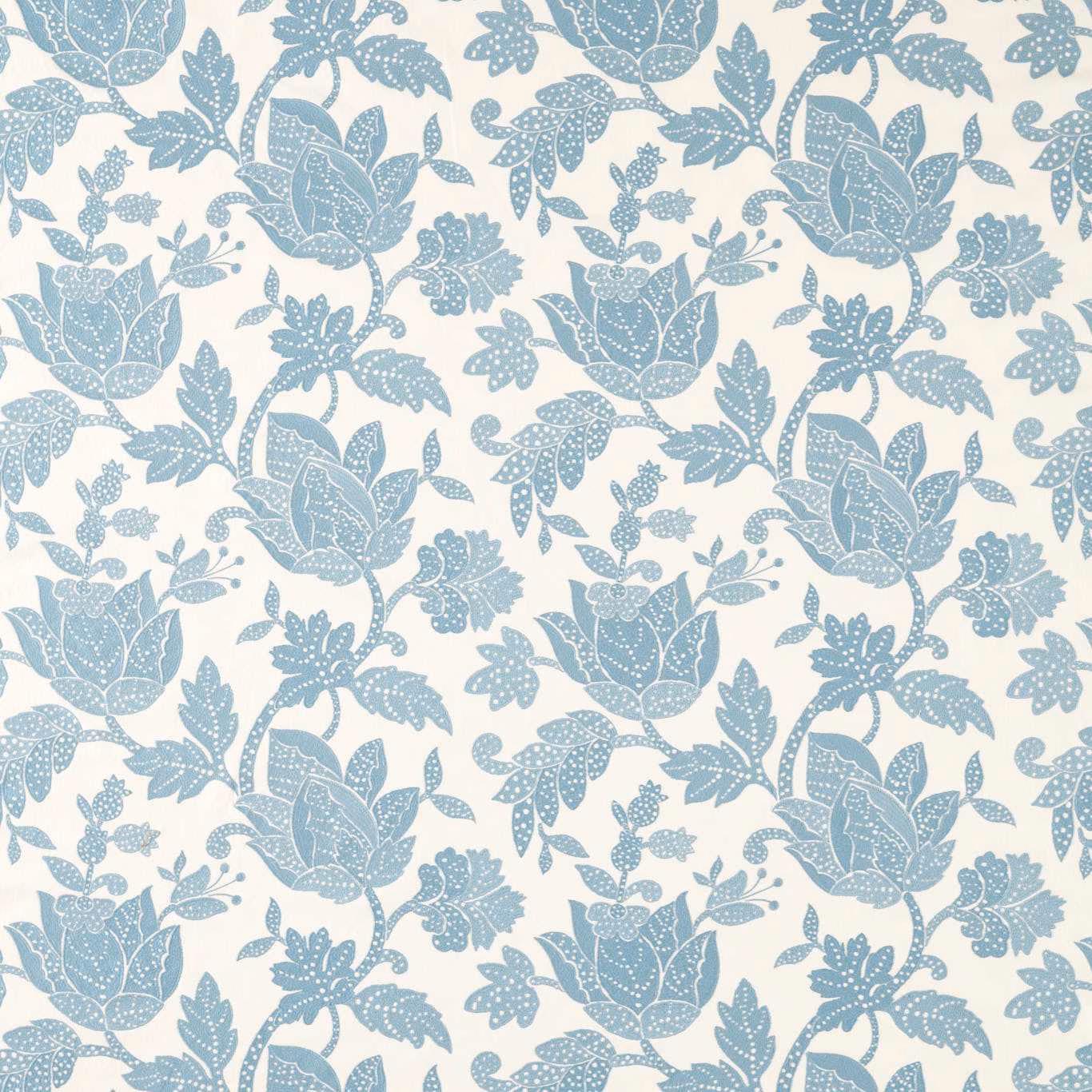 Dusty blue floral blooms and dotted leaves on a cream ground