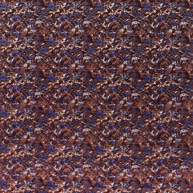 Close-up of dense burgundy and amethyst weave with cream flecks and blue accents