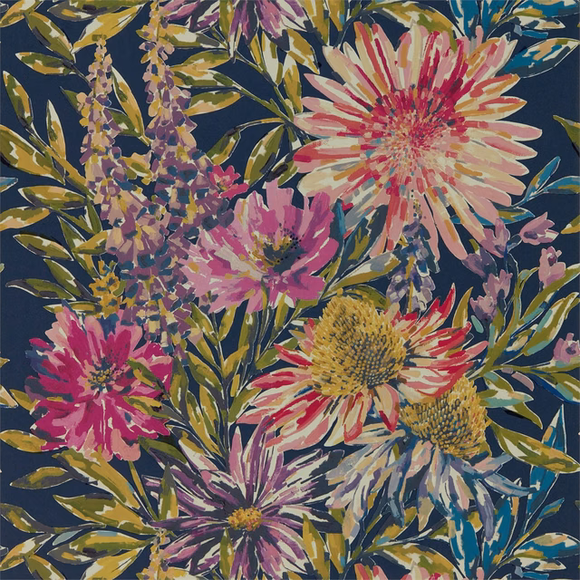Dense floral wallpaper in navy with pink, lilac, cream and olive painted blooms