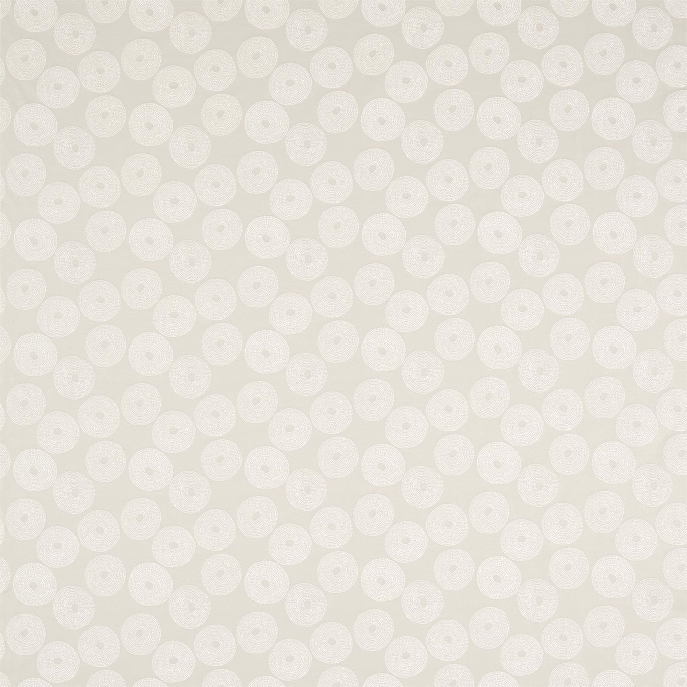 Soft oyster cream textile with evenly spaced textured circular motifs and a gently woven surface