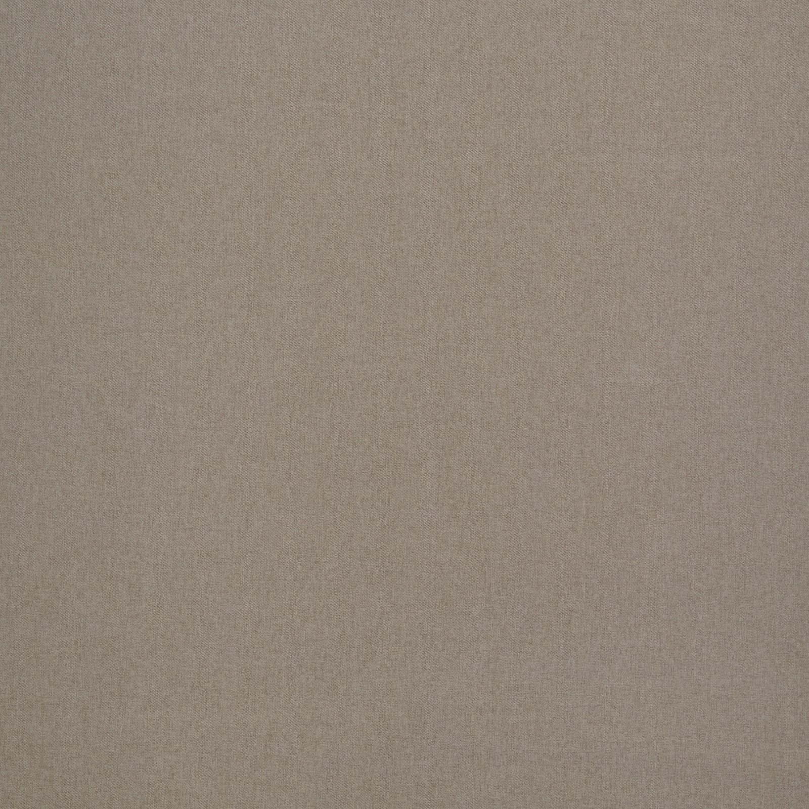 Close-up of plain biscuit beige woven fabric with a soft matte texture