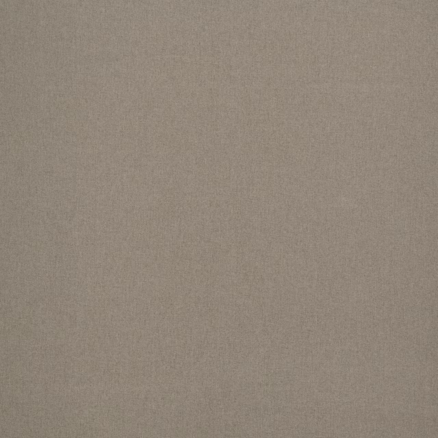 Close-up of plain biscuit beige woven fabric with a soft matte texture