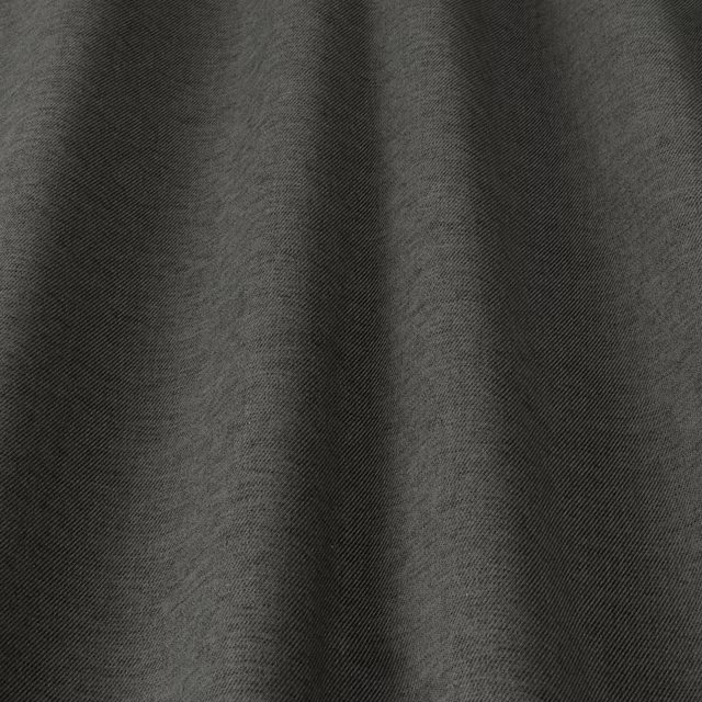 Close-up of deep charcoal grey woven fabric with subtle diagonal texture