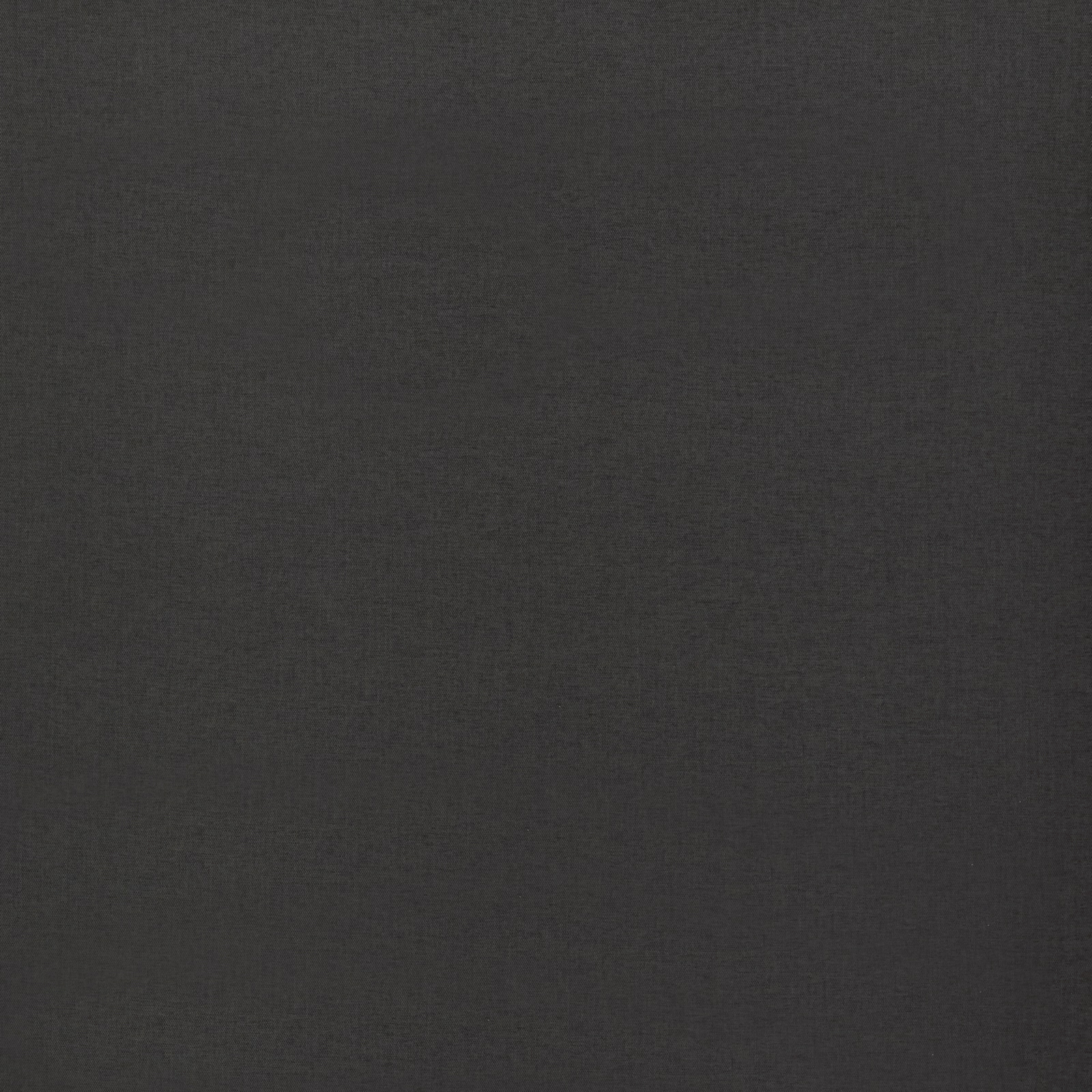 Close-up of plain charcoal grey woven fabric with a smooth matte texture