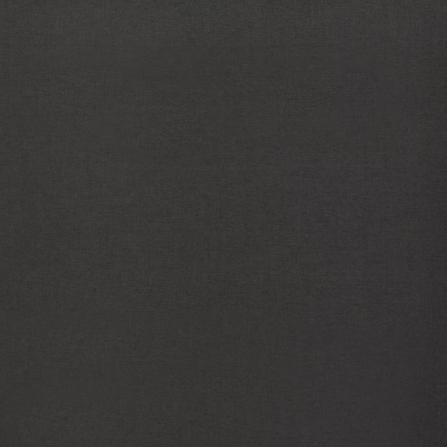 Close-up of plain charcoal grey woven fabric with a smooth matte texture