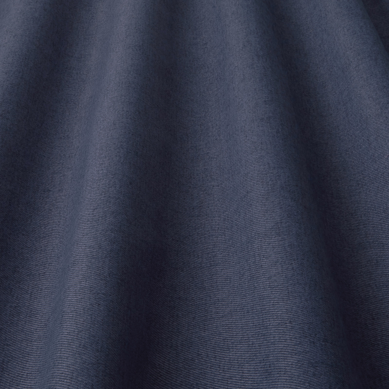 Deep indigo blue plain-woven fabric with subtle rippled texture
