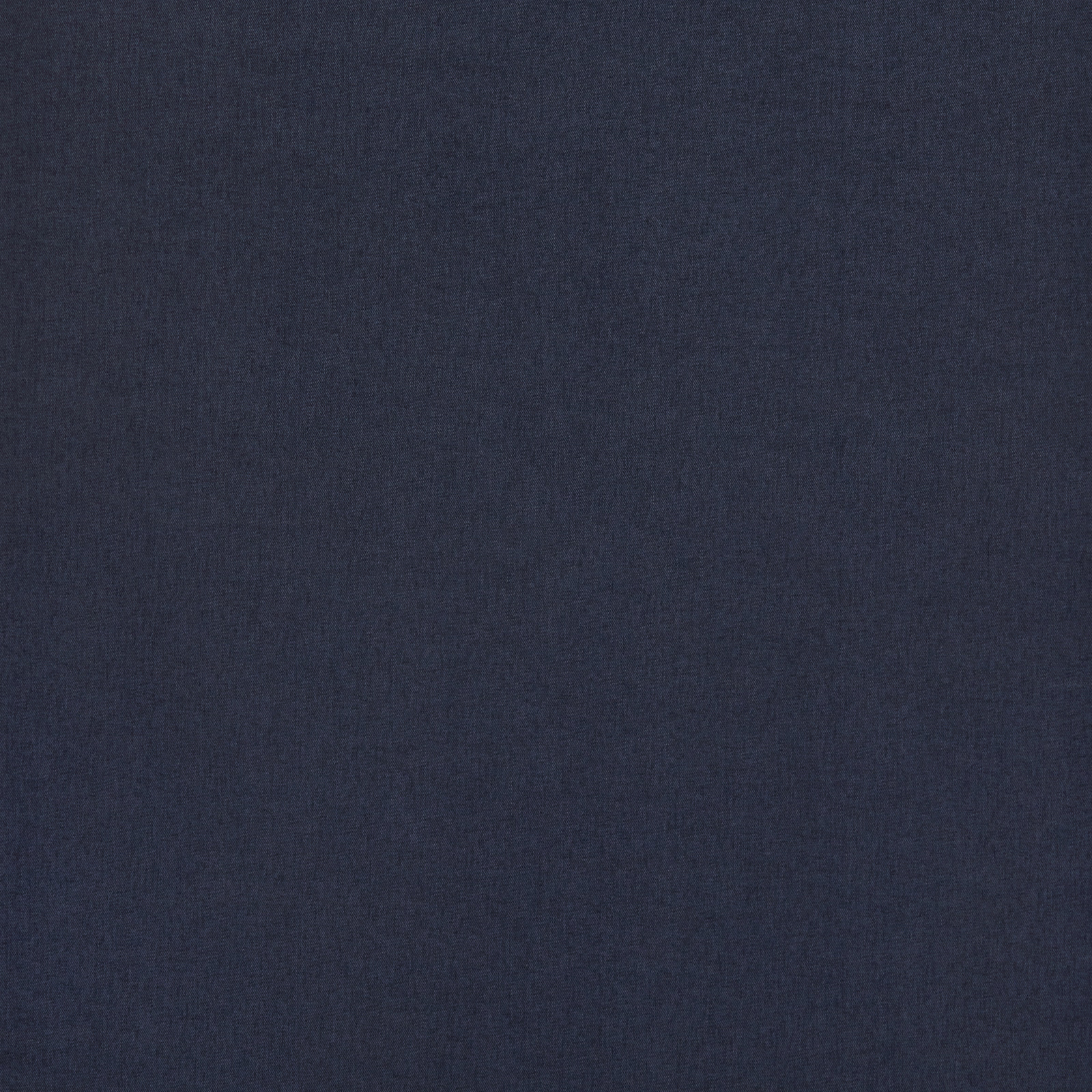Close-up of deep indigo plain-woven fabric with a fine matte texture