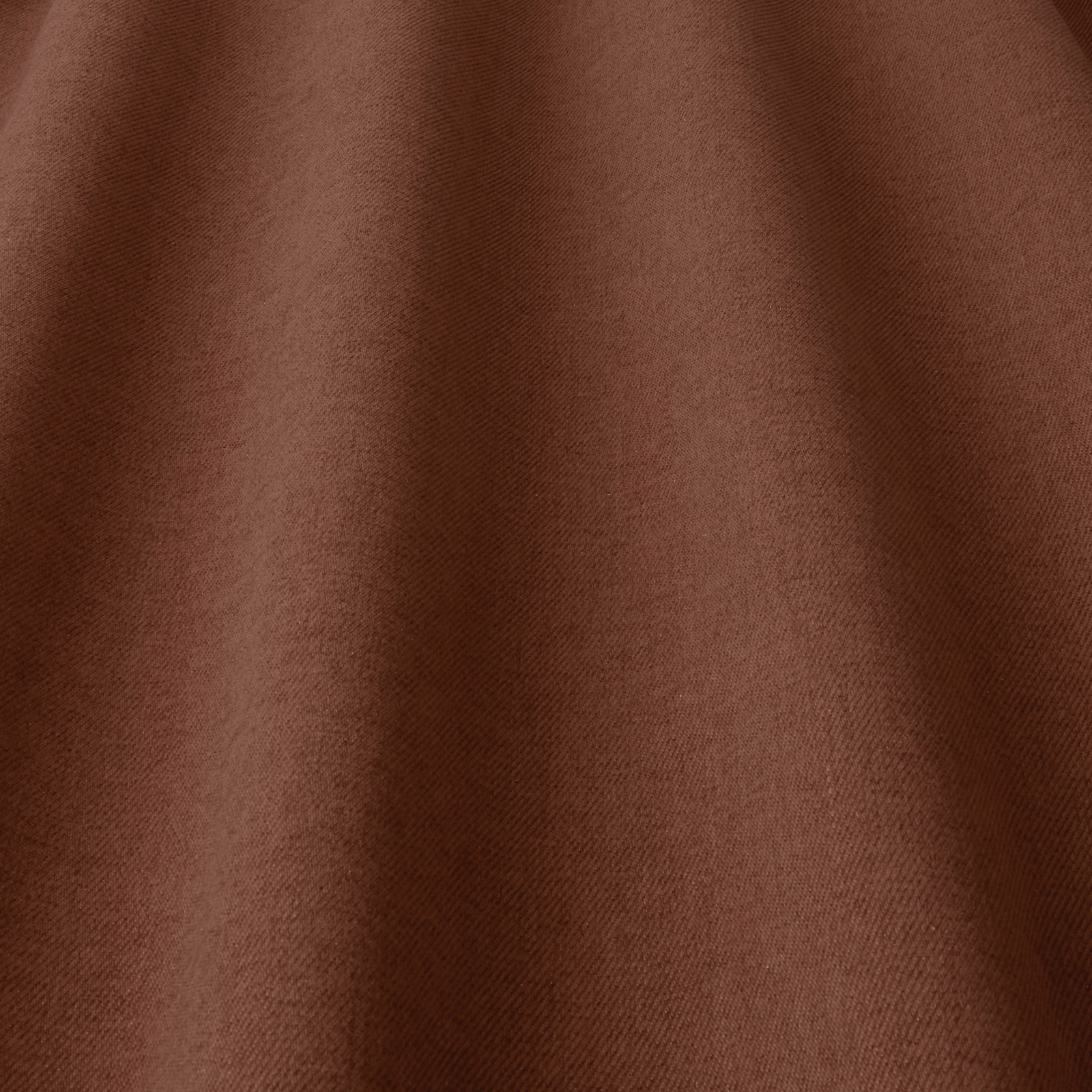 Close-up of warm terracotta-brown woven fabric with soft matte texture