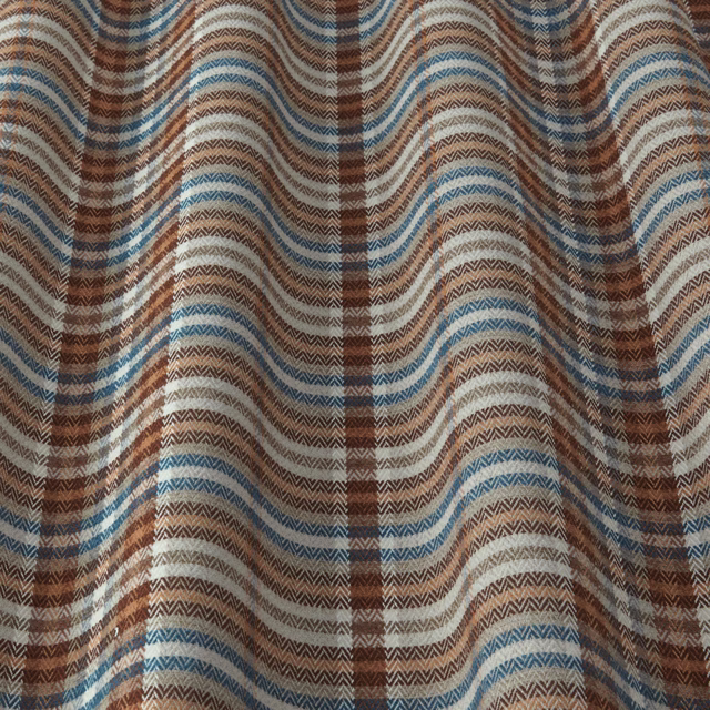 Wavy burnt sienna, cream and blue chevron-striped woven fabric